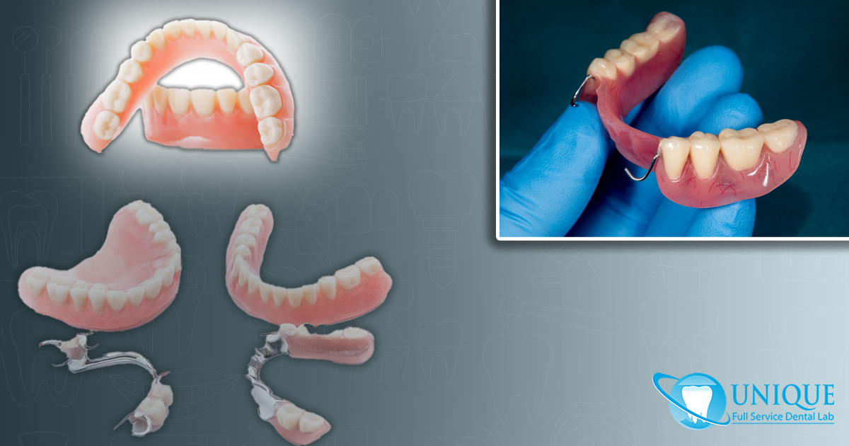 hand-holding-acrylic-denture-with-metal-clasps-set-of-dentures-and-clasp-denture-with-metal-arc